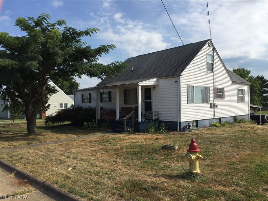 Conveniently located 1.5 story 4 bedroom South Parkersburg home situated on a large double lot.  Home has some updates including remodeled bathrooms and new insulation and drywall in the living area.  Features include a breakfast nook, back deck, carport, walk out basement with workbench and new mulch in landscaping.