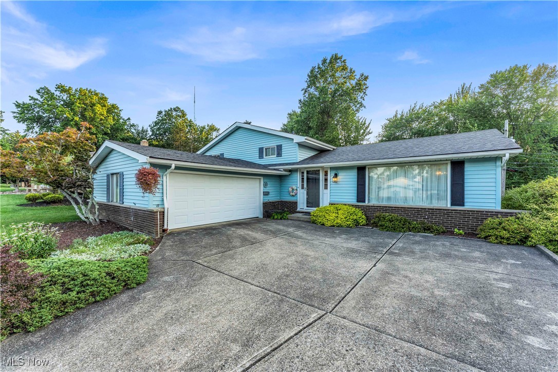 Welcome to this beautifully maintained 4-bedroom, 2 full bath split-level home nestled on a quiet, tree-lined street in the desirable Parma community. Offering a perfect blend of comfort, functionality, and style, this home is ideal for families or anyone looking for extra space. Step inside to discover an inviting living or dining space with large windows that fill the space with natural light. The kitchen features plenty of cabinet space, complete with appliances, and a cozy dining area perfect for gatherings. The upper level offers four spacious bedrooms with generous closet space and a full bath. The lower level boasts a gorgeous fireplace, a second full bath, and a spacious family room, perfect to use as additional living space. A separate laundry/utility area adds convenience and extra storage. Enjoy the seasons in the private, partially fenced-in backyard, ideal for entertaining, gardening, or relaxing on the patio. Additional highlights include an attached garage, central A/C, and newer mechanicals for peace of mind. Conveniently located just minutes from schools, parks, shopping, restaurants, and easy highway access, this home offers everything you need in one of Parma's most sought-after neighborhoods. Don't miss your chance to own this move-in-ready gem. Schedule your private showing today!