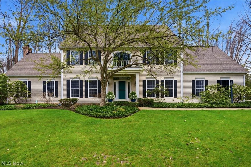 Tucked quietly at the end of a private cul-de-sac, this stunning colonial offers the perfect blend of elegance, comfort, and modern updates all within the award winning Kenston school district. A welcoming front walkway leads to a dramatic two-story foyer. A beautifully positioned home office with custom built-ins provides both functionality and style, while the formal dining room showcases exquisite millwork and picturesque views of the front grounds. The expansive family room is truly the heart of the home, featuring soaring ceilings, a striking gas fireplace with a custom, ceiling-height surround in a distinctive hue, and oversized windows that fill the space with natural light. French doors open seamlessly to a screened-in porch. The completely renovated kitchen is both sophisticated and inviting, anchored by a substantial stone island and complemented by new fixtures, stainless steel appliances, and a generous walk-in pantry. The adjoining eat-in area offers sweeping views of the backyard, making it the perfect place to gather. A stylishly updated half bath w new wallpaper, new fixtures, and vanity, along with a convenient first-floor laundry room, complete the main level. Upstairs, the serene primary suite offers a private retreat including dual walk-in closets with custom built-ins, and a versatile adjoining space ideal for a sitting room, dressing area, or flex use. The luxurious en-suite bath features a soaking tub, separate shower, and dual vanities. Two additional well-sized bedrooms share a Jack-and-Jill bath, providing both comfort and convenience. The lower level expands the home’s living space complete with an additional bedroom and full bath—perfect for guests or extended stays. Outdoor living shines in the warmer months, with a beautifully landscaped backyard featuring a brick patio, tranquil water feature, and ample space to relax or entertain. This is a rare opportunity to own a truly exceptional home in one of the area’s most desirable locations.