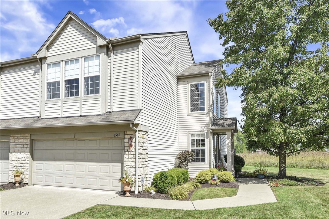 Don’t miss your chance to own this rare 3-bedroom end-unit townhome at 8581 Dunham Drive in Olmsted Township! Tucked within a well maintained community, this standout home offers the perfect blend of privacy, space, and style. From the moment you arrive, the private side-entry walk-up sets the tone for something special. Step inside to a bright, welcoming foyer that opens to a spacious, light-filled living room—ideal for relaxing or hosting guests. The open-concept flow continues into the dining area and kitchen, featuring a gas range, pantry, and a convenient pass-through that keeps the conversation going while you cook. Upstairs, you'll love the versatile loft—perfect for a home office, play area, or cozy reading nook. The stunning primary suite is a true retreat, complete with a sitting area, walk-in closet, and private en-suite bath. Two more spacious bedrooms, a second full bath, and a convenient second-floor laundry room make everyday living a breeze. Step outside to one of the larger yards in the community, featuring mature trees, accent lighting, and a private patio—your own outdoor oasis! A two-car attached garage adds to the everyday convenience of this incredible home, which is ideally located near schools, shopping, and dining. Move-in ready and full of charm, this townhome checks all the boxes—schedule your showing today and experience it for yourself!