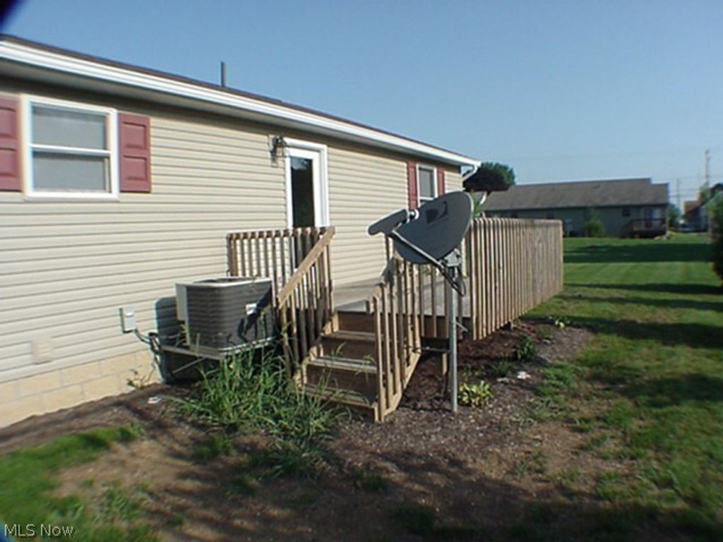 Photo of 186 9th Street SW #D, Strasburg, OH 44680 (MLS # 5213255)