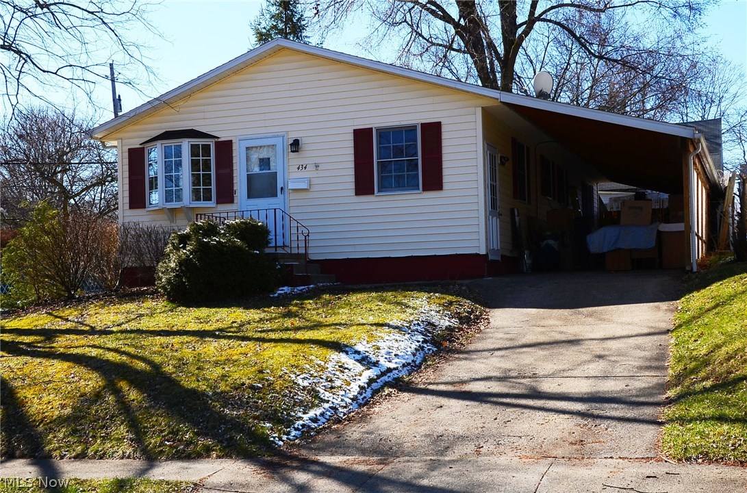 Nice 4-Bedroom Ranch in Ellet. Large eat-in kitchen with appliances. Freshly Painted with New Carpet in the Living Room, Hall and 2 Bedrooms & both Bathrooms updated. Finished Basement features a Game Room and Family Room with a Billiards Table, a Bar and a Gas Fireplace. Fenced in Back Yard with Large Deck(2016). New Roof in 2010, Carport added in 2008. Conveniently located 6 blocks from Betty Jane Community Learning Center and Goodyear Metro Park.