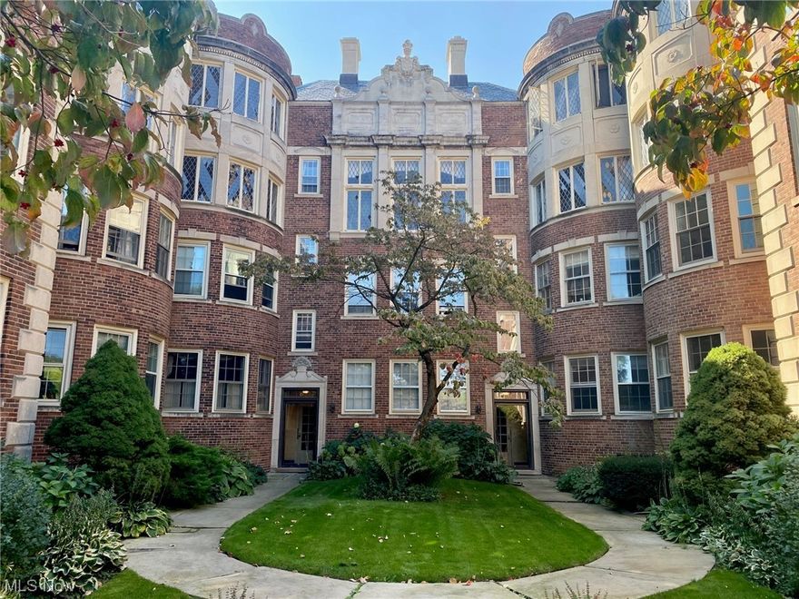 Art Deco Gem of a building designed by Alfred Wilson Harris. There is a gracious entrance, with a sizeable walk-in closet. Newly refinished Gleaming Hardwood Floors in a custom espresso stain flow throughout. To the right is the expansive living room, featuring Leaded Glass Windows overlooking the formal courtyard. The Oversized Living Room can accommodate the dining room. This space features Curved Walls, Large Wood-Burning Fireplace & Designer Lighting. The living room opens through an Arched Hallway to an area that could be used as a 2nd bedroom, family room or office space, take your pick! Adjacent to this space is a remodeled kitchen with all new and never used Dishwasher, Gas Stove and Frig. The 3-yr warranty on these appliances is transferable. A bedroom is located at the back of the condo overlooking a Tranquil Park Setting affording the resident a peaceful sleep. Total of 4 Huge closets! HOA for this unit is only $407/month: includes water, sewer, snow removal, trash removal, heat for the unit & garage as well as exterior building & lawn maintenance. Third floor walk-up. No elevator in this section of the bldg accounts for the low HOA. It means you will not be accessed for elevator repair. The basement houses the laundry, a small gym and storage space for bikes & personal storage units. You can get to your dedicated heated garage space via an enclosed underground pathway. You can also have a garden space. Close to Shopping, Restaurants, Main Library & Rapid Transit.