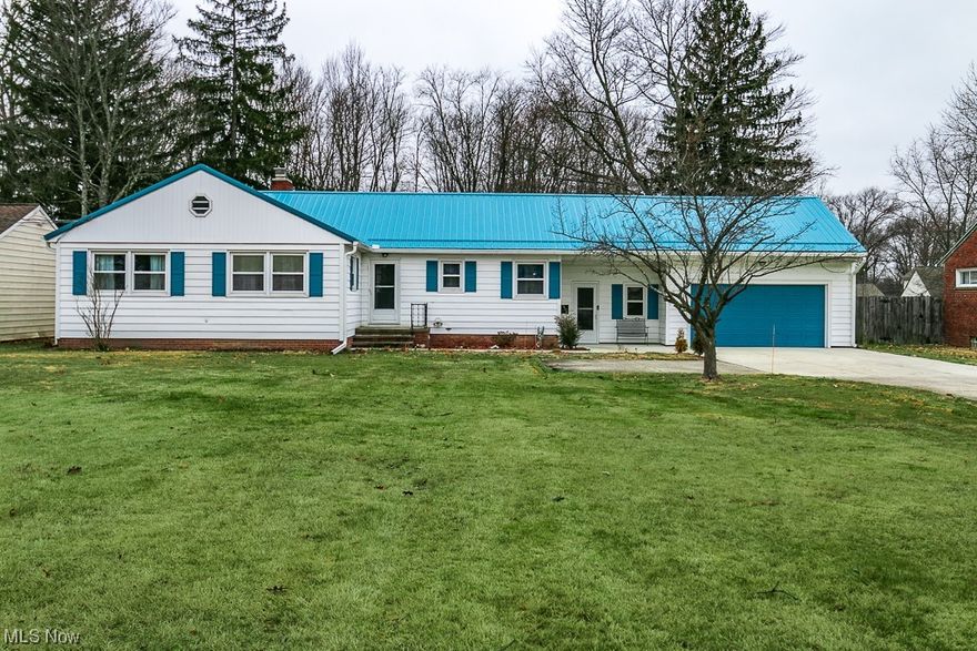 Charming and totally updated ranch style home located in a well sought after area of Strongsville.  This home sits on over 3/4 of an acre with a partially fenced in yard. With 4 bedrooms and 2 bathrooms this home provides ample space for comfortable living. This home offers a well designed and open floor plan. Welcoming grand foyer leads you into the living room with a fireplace and opens to a state-of-the-art kitchen that features tall white shaker cabinets, Quartz countertops, stainless appliances, center island and a sliding door to lead you out to a huge deck (with gas hook ups for your grill) overlooking the park like yard with A storage shed. There is a spacious heated breezeway that connects the kitchen to the garage.  The master suite comes with its own master bath. Two additional spacious bedrooms and another full bath make up the main floor. This rare ranch offers a massive and unique finished second floor that has double insulation, walk in closet, and can be used as a fourth bedroom. The finished lower level offers an abundance of living space and storage. Recent updates include the updated bathrooms, updated kitchen, new flooring, new light fixtures, fresh paint, new glass block windows, new furnace (1/24) metal roof (11/22), A/C compressor, and much much more. Enjoy a peaceful neighborhood with convenient access to nearby schools and amenities. Call to arrange a  private tour.