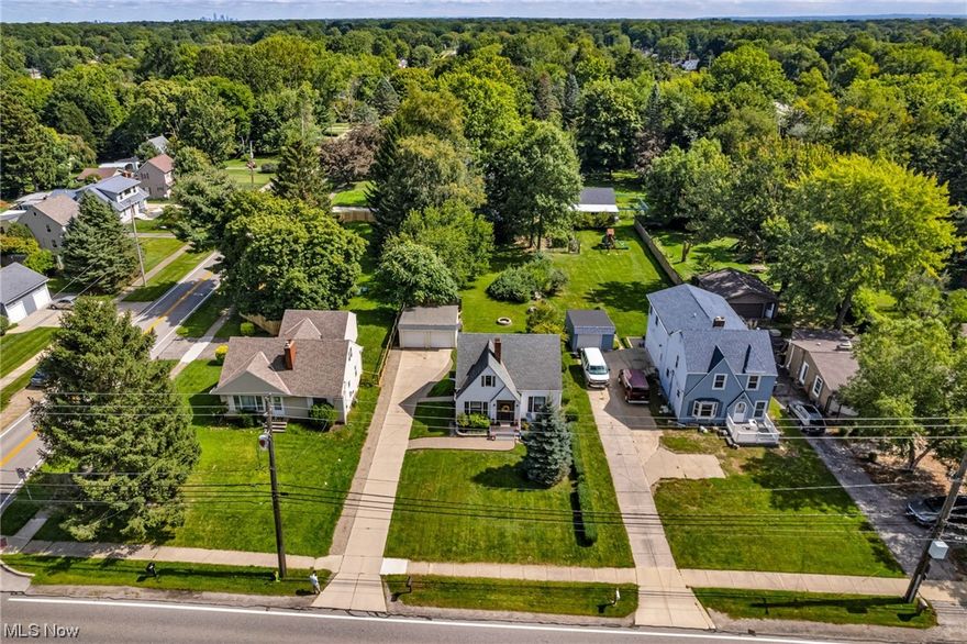 Finished. Polished. Absolutely move in ready. This wonderful Westlake home in offers loads of style, wonderful updates, and  home ownership in one of Cleveland's finest suburbs at an entry level price. Tasteful, fresh, youthful decor. Living room with trayed ceiling matching the new fireplace mantle. New replacement windows. New flooring. New kitchen and bath.  2 bedroom plus But there is an unfinished 2nd floor w/plenty of room for a 3rd bedroom/master suite. Fresh neutral paint throughout. (High roof line, exposed brick chimney, pine floors, dormer and easy access to main stack for a master bath.) There is literally nothing you need to do but plenty that you can. The basement provides glass block windows, abundant storage, the laundry, a recreation room area - and it is plumbed for a 3rd bath. A tremendous yard features a private patio behind the 2 car garage. All this on a huge 60x300 lot. Great for entertaining. (Fire pit included.) A rare opportunity in a great location convenient