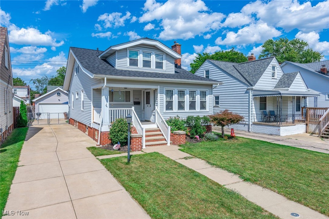 Wonderful Colonial home on a desired street is certain to impress. Warm living room with fireplace opens to spacious dining room with built in cabinets. Remodeled kitchen offers loads of cabinet and counter space. Great layout with 2 bedrooms and full bath on the first floor... and 2 bedrooms and full bath on the second floor. All updated bathrooms. Basement offers finished recreation room, storage room, workshop, laundry room and half bath. Vinyl siding. Replacement windows throughout. 2 car garage with additional storage / workshop / hobby room was built in 2002. Fully fenced yard. Concrete driveway. Newer roof 2022. Newer hot water tank 2024. All appliances stay. Front porch and back patio provide the perfect place to enjoy the outdoors. You've found it... call agent today.