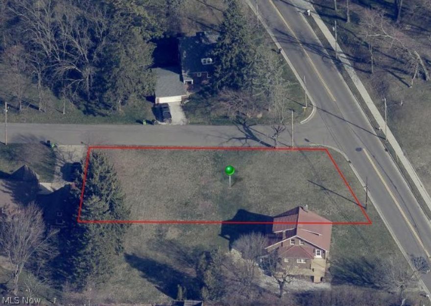 Large corner cleared and flat lot in coveted North Canton just 3 minutes to Rt 77 and 5 minutes to the strip with its numerous restaurants, coffee shoppes and all types of shopping.  Close to Stark Community College and KSU Stark Branch.  Public Utilities Available.  May be sold alone or with next door residence at 545 Pittsburg Ave. NW