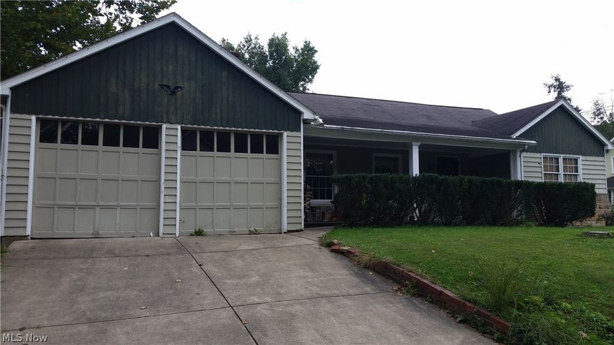 A very solid home with a desirable semi open floor plan featuring a large living room combined with a dinning area. A beaurtiful stone fireplace and wormy chestnut solid wood panelling are the the focal point of the living rrom. The home has a large kitchen with solid wood cabinet. Hardwood floors are found thru out the house. The home sits on a a very nice corner lot at the end of Eastlawn Avenue. A privated screened in porch is perfect for relaxing  and there is also a covered front porch all  yours to enjoy. A two car garage with direct acces to the home will keep your cars warm and dry. The home has had french drains and sump pump added to keep the basement dry. The home boasts a high efficiency newer furnace/ac, and a newer hot water tank. Storage will never be a problem for the attic is completely floored and acceable