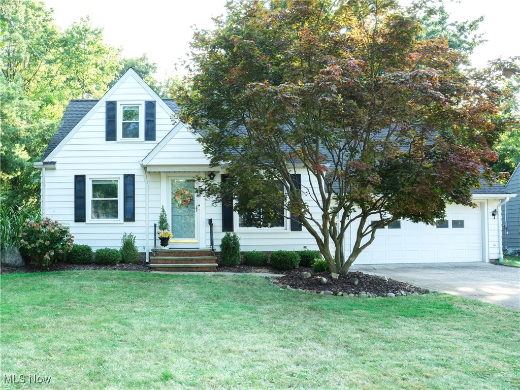 Move-in ready Willoughby bungalow with 2-car attached garage. This 3-bedroom home has many updates throughout the house and is a great blend of modern updates with classical architectural features such as hardwood floors, cove ceilings, and an arched doorway. The remodeled kitchen has newer cabinets with stainless steel appliances and newer windows. About the same time, the bathroom was updated and a new window was installed. Speaking of windows, in 2022 the living room, all 3 bedrooms and the attic had new windows installed with a transferable warranty. One-floor living is possible with 2 bedrooms on the first floor. The largest bedroom is on the second floor, featuring vaulted ceilings. The oversized 2-car garage is accessible from the home, no scraping snow off your car! Ascending the full staircase in the garage leads up to the unfinished attic that has multiple possible uses. The attic can be used for storage as-is, or you can turn it into a bedroom or great room and open up access from the second floor. The back yard is fenced and has a shed, plus entertaining is easy on the newer patio. This is a must-see home!