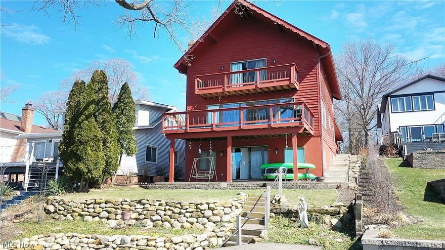 Fabulous Lakefront Home located on the West Reservoir (main chain) at Portage Lakes. Completely Remolded top to bottom. This Waterfront home is in pristine condition and offers 4 bedrooms (1 on the main floor & 3 on the UL), 4 full baths (2-UL, 1-MF & 1-LL), two fireplaces, and a finished walkout Lower Level. Enjoy the spectacular lake views from all three levels! As you enter the foyer, a lovely gathering area leads to the beautiful Schrock kitchen w (granite countertops/stainless appliances/center island/glass tile backsplash/plenty cabinets space). This open concept kitchen leads to the dining area, great room w/gas fireplace, a wall of windows & sliding door to the deck with a breathtaking panoramic view of the lake. The Redesigned master bedroom (UL) features a private balcony with a fantastic view of the lake, a large walk-in closet (13x8), and a master bath w (double sinks/Marble counters/a large walk-in tile surround shower w dual showerheads). The finished lower level offers a
