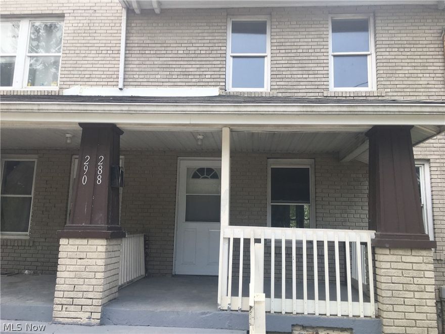 Very spacious apartment set up like a townhouse.  The rental home has covered front porch, spacious living and dining area, and galley kitchen with refrigerator and stove on main floor.  The upstairs has one full bath, large bedroom with two closets and a second smaller bedroom that has new flooring.  The unfinished basement is private with individual laundry hook ups and plenty of storage space. Off street parking available. NO PETS! Professionally managed. $35 applications fee online.