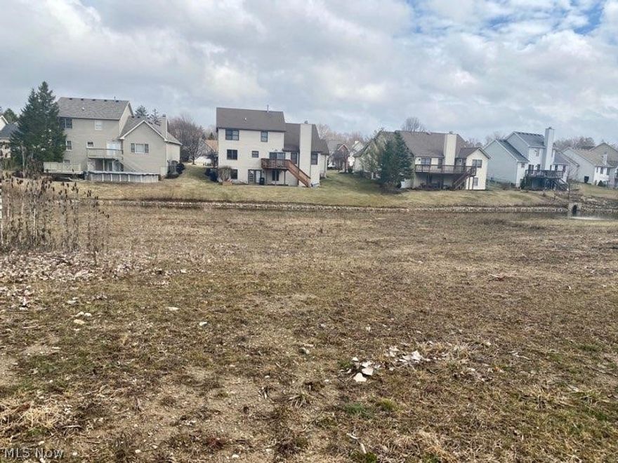 Prime condo development of vacant land with public utilities for builder to finish buildings in established condo community.  Highly accessible and very well maintained with low HOA fees.  This is for a 6 unit building.  See also MLS# 4174644, 4174646, 4174649