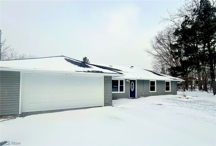 Welcome to your dream RANCH home, a haven of modern comfort and style, ideally situated on almost an acre of land in the highly rated Hudson School district. This stunning residence boasts three bedrooms with new carpet and two fully updated bathrooms, featuring all brand-new fixtures that shine with contemporary elegance. These updates include the vanities, showers, tile, toilets and flooring!

As you step inside, be embraced by the warmth of fresh paint and brand-new flooring that extends throughout the house, setting the stage for your family's cherished memories. The heart of the home, a fully updated kitchen, is equipped with a suite of new appliances, including a dishwasher, microwave, and stove, ready to inspire your culinary adventures. It boasts new Quartz countertops and new soft close cabinets with new, modern hardware as well!

Light cascades through updated fixtures, illuminating each thoughtfully designed space and highlighting the seamless flow of the home's layout. The convenience of an attached two-car garage ensures ample space for vehicles and storage, adding to the ease of your daily routine.

The exterior is not to be overlooked, with a new roof and new gutters that promise peace of mind and longevity. Each element of this property has been carefully considered and updated to meet the highest standards of modern living. This includes the new septic system that was just recently installed. 

Imagine serene evenings and lively gatherings in this tranquil space, all within a community that values the joys of family and home. This turn-key property is more than a house—it's a foundation for a lifetime of happiness. Don't miss the opportunity to make this impeccable abode the backdrop for your family's future.