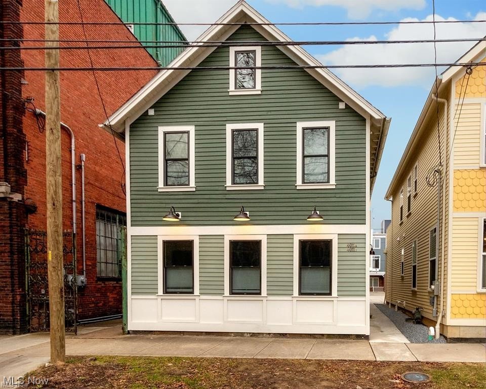 Available early June! Incredible design and renovation. 2 bedrooms, bonus room, 2.5 bathrooms and first floor laundry. Off street parking space and snow/trash/water/sewer included! Live close to the shops and retail of Lorain Avenue and walk up Bridge where it dead ends into West 25th Street. Security system included and house is wired with cat6 ethernet to take full advantage of internet services over 1 gpbs! Engineered oak floors throughout are stylish, consistent and durable. Thoughtful layout is open and flows nicely. Jaw dropping kitchen with large quartz center island, black tile backsplash, custom shiplap range hood, pantry space, designer fixtures and stylish coffee corner. Great storage in the basement! Custom iron and wood rail takes one to 2nd floor bedrooms & third floor bonus room that can be office, studio or blank palette for tenant's choice. On 2nd, the master features a walk in closet with shelving system and tiled bathroom with delightful glass walk in shower. Exposed