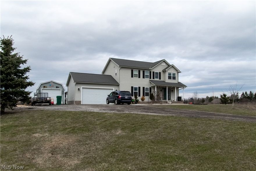 Welcome home to 14100 GAR HWY, Chardon. This beautiful home sits back off the road situated on approximately 3.25 acres with landscaping. Covered front porch overlooking the sloping yard with winding driveway. Welcoming foyer leads into a spacious Living Room with wood fireplace, new waterproof plank flooring, & large windows overlooking the large back yard. Eat-in Kitchen & formal Dining Room is great for entertaining. Lovely rear deck with pergola for your summer enjoyment. First floor laundry with storage & convenient half bathroom on the main level. Large master suite with huge closet & bathroom. 2nd & 3rd bedrooms have new hardwood floors & finishes. 4th bedroom is currently used as an office. Full basement with additional storage & recreational area. Two car attached garage & large shed allow for extra storage. 2nd shed is used for a dog kennel. Front & backyard are separately installed with invisible dog fencing. Great for keeping your beloved pets contained. Scheduled you showi