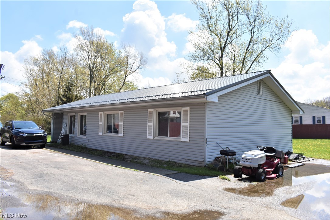 Newer construction ranch home on a nice sized lot with a fully fenced in yard! This home offers 3 bedrooms, 2 full baths and a nice open layout. Enter through the foyer with ample closet space, then step into the living room with vaulted ceilings & open feel. The large eat-in kitchen offers plenty of cabinet space & a new stove & dishwasher (March '18). Carpet throughout has been replaced in Feb '18. Convenient laundry / utility room is located on the main level - this is true one floor living! Master bedroom offers its own full bathroom and lots of light with a view of the backyard. The other two bedrooms are also nicely sized & all have newer light fixtures with fans. The new metal roof has a 50 year life. Heat throughout is radiant which runs through the floor. Set up a showing on this one today!