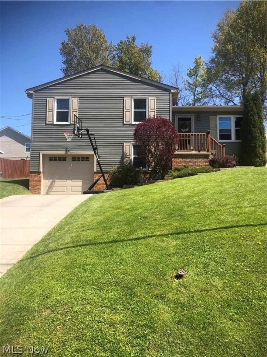 This move in ready Split level home has been completely updated!!! New roof, siding, gutters and facia, windows, flooring, furnace. AC, updated bathrooms, 6 panel oak doors and trim and a NEW above ground all resin saltwater POOL with a deck...nothing left to do but move in! Within walking distance of school and downtown, this location adds convenience to the list. Come and take a look!