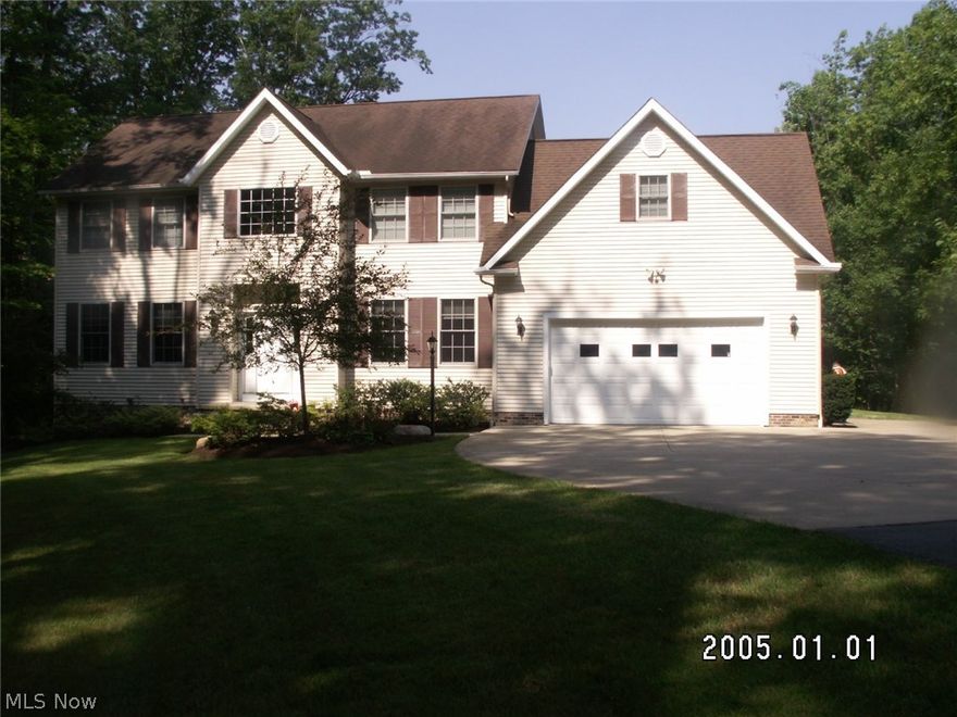 Wonderful 4 bedroom center hall colonial on 1.63 acres. Come and make Chesterland your new address. This home sites back off the street and makes it seem like an oasis among the trees. Well thought out spaces include a formal dining room, living room, family room & eat-in kitchen that opens to a huge 3 season room.