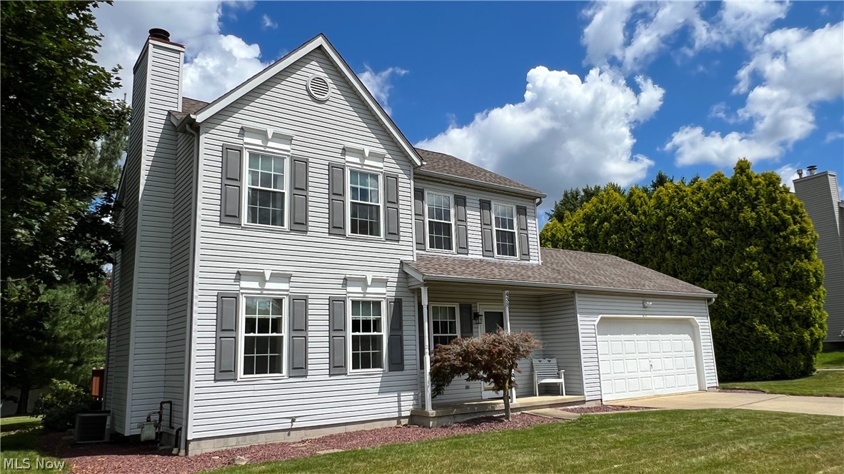 This immaculate gem has it all, fantastic updates, great location on over half an acre of lush, treed land with a private backyard oasis, conveniently backing to Muhl Park with soccer fields, a basketball court and playground. 1st floor offers a roomy great room with hardwood floors and cozy gas fireplace. Large eat-in kitchen shines with newer countertops and stainless steel appliances (2019). Enjoy the practicality of a first floor laundry room and a half bath. The second floor boasts newer carpet (2020) and features a master bedroom with an ensuite bath, two additional bedrooms, and a full bath. The lower level is perfect for entertaining or guest stays with a finished rec room and an office/fourth bedroom with an egress window and safety ladder. Updates include room and sliding door (2011), furnace (2012), C/A (2022), garage door opener (2013), front door and garage entry door (2014), and vinyl replacement windows (2017). Whether hosting friends or enjoying a quiet night in, this home is designed for your lifestyle!
