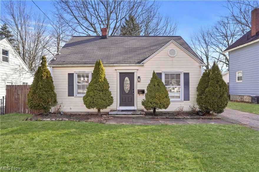 This charming Cape Cod-style home exudes warmth and character from the moment you set eyes on it.  This residence offers a perfect blend of traditional charm and modern comfort.  As you approach the property, you're greeted by its classic facade featuring a symmetrical design, and steeply pitched roof —a quintessential element of Cape Cod architecture. Step inside, and you'll find yourself in a welcoming living room with hardwood floors that set the tone for the rest of the home. The interior boasts a cozy yet spacious layout. The living room is bathed in natural light streaming through the  windows, creating a bright and airy atmosphere. The classic kitchen with stainless steel appliances and glass tile backsplash has plenty of workspace and storage.  Slide open the beautiful barn doors off of the living room to a flex room that can be made into a room suitable for your personal family needs, a bedroom, office, etc. Another bedroom and must-see stunning jewel-toned bathroom complete the main floor.  On the second floor, with freshly painted walls and new flooring is a very spacious bedroom. Outside, the backyard provides a tranquil escape from the hustle and bustle of everyday life. Mature trees offer shade and privacy, while the well-maintained landscaping adds to the home's curb appeal.  Conveniently located near schools, parks, and shopping, this Cape Cod gem offers the perfect combination of small-town charm and modern convenience. If you are looking for a cozy place to call home, this Ohio Cape Cod has something for everyone.  UPDATES include: basement glass block windows (2023), paint throughout (2023), electrical panel (2023), new flooring on 2nd floor (2023), bathroom pedestal sink and fixture (2023), hot water tank (2022).  ONE YEAR HOME WARRANTY PROVIDED!