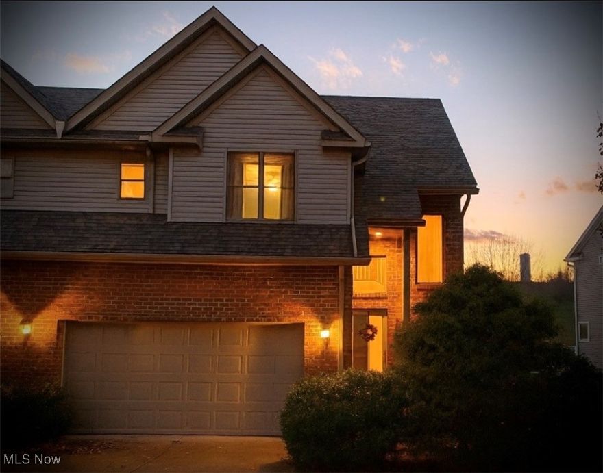 Just outside city limits and close to everything! You will love this hard to get curb appeal 2 primary bedroom, 2 full and 2 half bath Townhome condominium in Natures Grove. The unit is 1 of 18 and includes a two car garage. The large level driveway leads you into the vaulted foyer with chandelier. Neutral colors throughout the home are ready for your decor. The open living room, dining area and kitchen is great for entertaining which includes a  pantry closet and a 1/2 bath.  All appliances to stay in this open eat in kitchen with lots of cabinets and counter space,  Enjoy walking out to the large deck overlooking a beautifully treed lot and association walking trail. The spacious finished lower level for rec/exercise room. Plenty of space for all that equipment or wind down with a sectional couch and pool table. Also includes a 1/2 bath. The upper level has 2 primary bedrooms, each with their own full bath and pocket doors. The larger of the two rooms, has additional space for an office if so desired. The laundry room is convenient on this 2nd level which includes washer, dryer, shelving, cabinet and large sink. Now is your chance for this well loved home owned since 2008, Seller is now relocating.  Don't wait, view today! New roof 2025. The Home Association fee is $300 monthly. See Association House rules and By-laws. The owner is responsible for snow removal on driveway and sidewalk. Home Warranty.