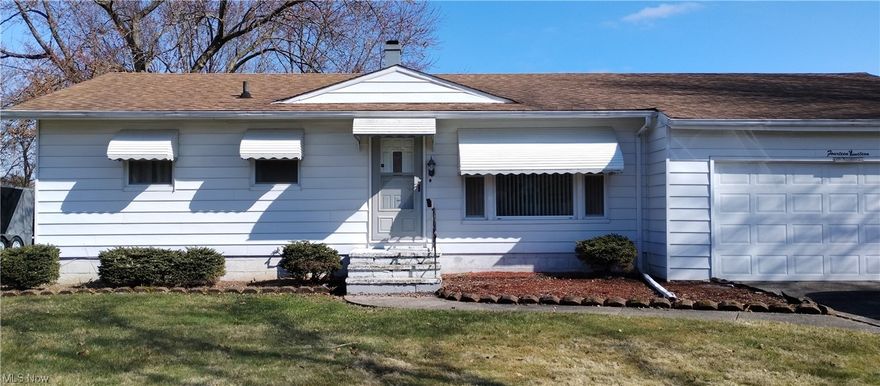 *Hurry on this one*Lots of little extras that have big impact*This three bedroom home sits on a lovely parcel with awesome rear, covered porch/deck that faces east for you to enjoy your morning beverage in the coming warm seasons*Wood floors in the living room, hall and bedrooms underneath the carpeting*The kitchen comes with appliances; the refrigerator hardly used*Though the oversized garage is "attached", access is gained from the rear of your new home*Storage shed in the back yard*The full basement is partially finished and where you'll find the laundry area with washer, dryer and wash basin*