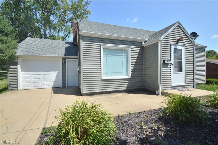 Cozy cape cod home in Struthers Schools.  The main level of this home plays host to a spacious living room with hardwood floors, an eat-in kitchen with all appliances, 2 bedrooms, and a full bath.  A large bedroom comprises the second level.  A partially finished basement adds a 30 x 11 family room with bar, laundry area, shower, and ample storage.  Exterior features include a one car heated garage, a rear patio, and a deep lot.  Roof, siding, windows and gutters installed in 2012.  Call today!!