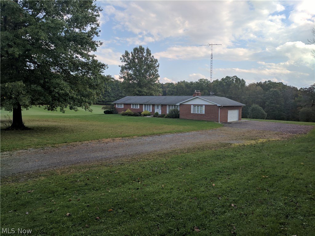This lovely brick ranch home was built in 1972 and sits on 10.6 acres. The property is conveniently located between Zoar, Dover & Strasburg and the home features 3 bedrooms, (2) full baths (2) ½ baths, living room, dining room, kitchen with a bar area, family room and 1st floor laundry. The home is in need of some cosmetic updates but is structurally sound and offers over 2,000 sq. ft. of living space. Other amenities include an attached 2 ½ car garage with hot/cold water and a full basement. The mechanics of the home include a Timber EZE wood burner, boiler system, air condition and a private well and septic. Schedule your private showing today or join us at the open house.