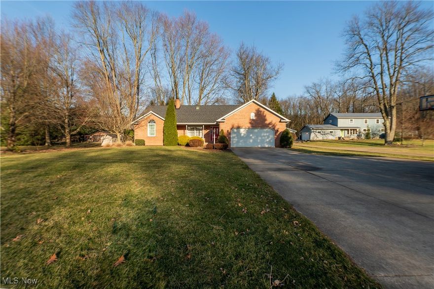 Welcome home to 5451 Arlington Road! This beautifully maintained 3 bedroom 2.5 bathroom home in Green Local School District has been well cared for and is ready for a new owner! When entering through the front door into the living room, you will instantly feel at home! With large windows and vaulted ceilings the room feels both modern and cozy! Off of the living room you will find your formal dining or you can go left where you will find two bedrooms and a full bath! Taking a right from the dining room will put you into the beautiful kitchen complete with vaulted ceilings, a large eat at granite countertop, and stainless steel appliances! Glass doors located in both the den off of the kitchen and the dining room provide access to the back deck and large yard, perfect for hosting and entertainment needs! The master suite is nicely tucked away in its own side of the home providing privacy and a peaceful retreat! First floor laundry located off of the garage entrance also provides extra convenience! The two car attached garage features both hot and cold water! With no lack of natural light coming in from the large windows on both sides of the home, this home has a welcoming atmosphere throughout! Another highlight of this property is the massive, fully finished basement, which offers plenty of space for recreation, storage, plus an additional bonus room that can be customized to your needs! The possibilities are truly endless with what you can do with the space! Call today to set up a showing and make this beautiful home yours today!