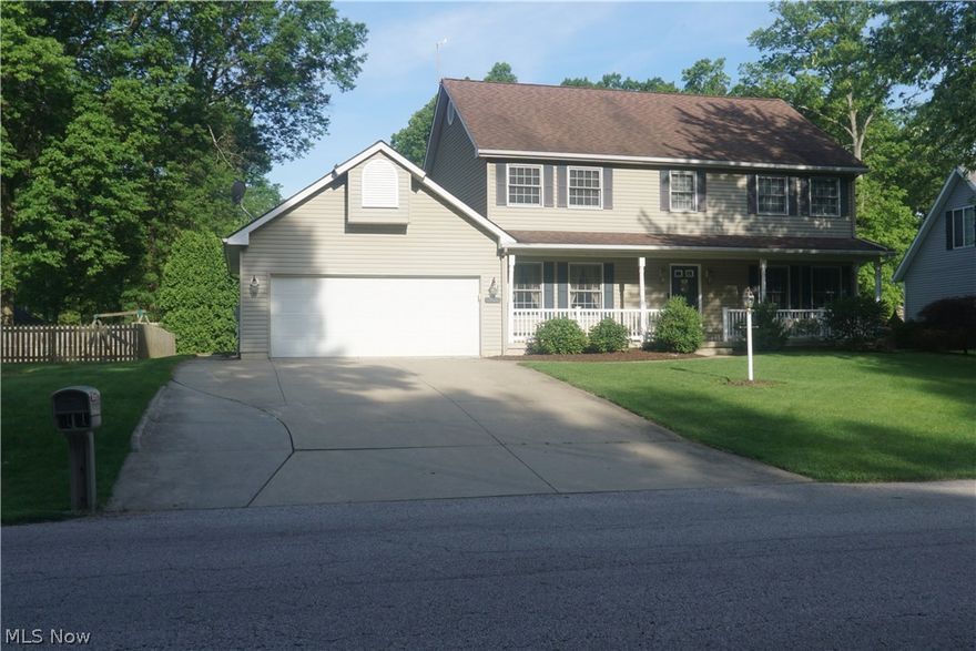 Spacious custom built 4 bedroom colonial loaded with features! All new carpeting on 1st and 2nd floors.  Large attached front to back tandem garage allows for nearly 4 cars! Family room connected with sliding glass panel doors to living room. Gas Log fireplace in family room with electric start. Spacious oak kitchen with stainless appliances and eating area.  Features a 26'x9' screened porch ("other room" in description) off kitchen eating area with view of and access to back yard.  Formal Dining Room off of kitchen, recently used as office.  Back concrete patio. Partially finished basement recreation room. Sump pump with battery backup. Convenient 2nd floor laundry room with utility sink connected to main bathroom. Includes a one year home warranty. A must see home!