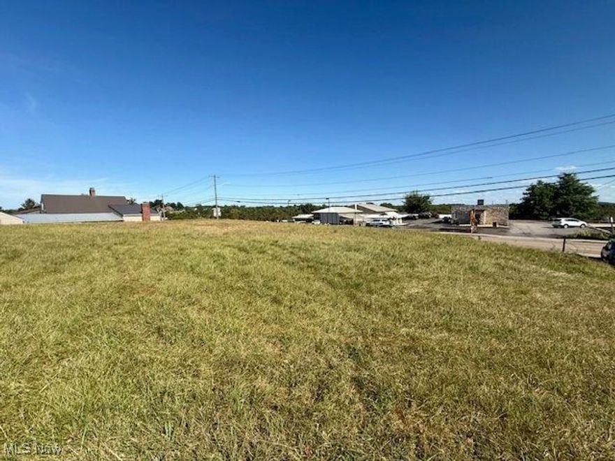 This level .97 acre lot right on busy Pennsylvania Avenue has 2 curb cuts for multiple access points, east and west. The lot is flanked by residential properties and faces commercial properties, including Weirton Elementary School and a popular coffee shop. All utilities are nearby for connection and there are sidewalks and streetlights right there. Your business or possible residential dream property is right here and ready for your personal touches in a fantastic area!