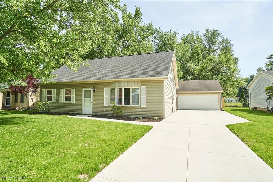 Beautifully updated three-bedroom cape cod home with vaulted living room ceiling that blends modern finishes with everyday comfort.  Freshly renovated and move-in ready, this property delivers upgrades buyers want with charm of an established neighborhood.  Newer luxury vinyl flooring and fresh paint throughout.  Renovated kitchen with all new cabinetry, new granite countertops, new stainless appliances-perfect for cooking, entertaining, or enjoying morning coffee.  Updated bathroom continues the modern theme with granite countertop and new vanity.  The large three season room adds valuable extra living space.  Fully fenced backyard.  Newer cement driveway.  Large two and a half car detached garage.  Home is conveniently located close to parks, schools, shopping, and major routes.  Well-updated with nothing left to do but move in. Complete with home warranty.