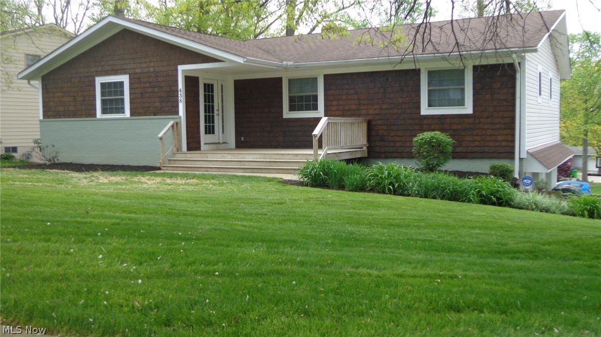Come Explore all Wyoga Lake has to offer in this nicely remodeled Ranch style home with a finished walkout lower level. The house boasts granite kitchen counters, stainless appliances, newer cabinets, and a host of other features. The 2 fireplaces having travertine tile faces add a touch of class and warmth for those chilly evenings. Trancending down into the lower level you'll find a finished basement with a walkout deck that expands the square footage of this home and allows for an office, playroom, extra family room/recreation room, or combination of a few of these. Either way this gem has the updates that hold value including newer roof, windows, furnace, appliances, siding, kitchen, deck, and bathrooms. Extending beyond the house you have a community that hosts countless activities throughout the summer months and beyond with a 60 plus acre lake, beach, park, sand volleyball court, etc. More details on that can be found on Wyoga Lake website or Facebook page. A great place to live
