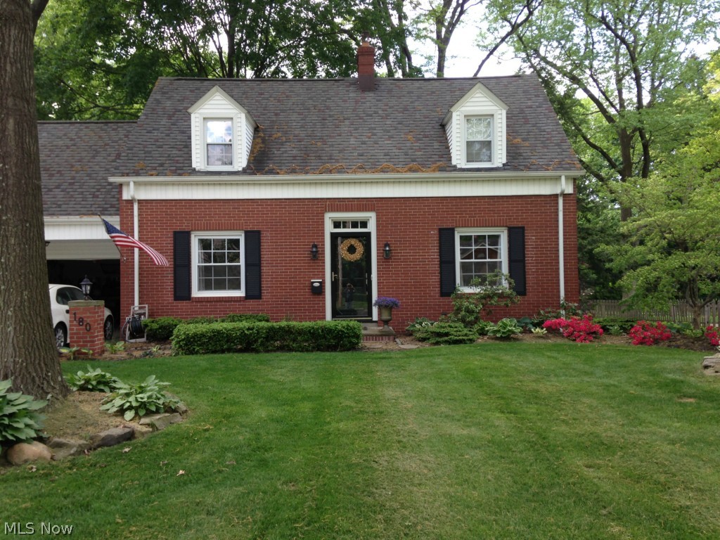 Absolutely gorgeous! Totally remodeled from top to bottom! 3 bedroom 2.5 bath Cape Cod on a large wooded lot. Gracious formal living room with a gas fireplace. Bright sun room with a wall of windows overlooking the back yard. Rich wood floors in the foyer, formal dining and beautiful new kitchen. Pretty white cabinets, granite counter tops and stainless appliances. Spacious master suite includes a sitting room or nursery and private master bath. 2 more large bedrooms and full bath complete the second level. Finished lower level includes a charming knotty pine rec room and plenty of storage. Many updates including: 200 amp electric, Trane XL80 furnace, water proofed basement, siding, roof, windows and doors. New kitchen and baths. Mud room addition. New carpeting, wood flooring, paint, security system, fence, shed, garage door and so much more! Absolute must see!