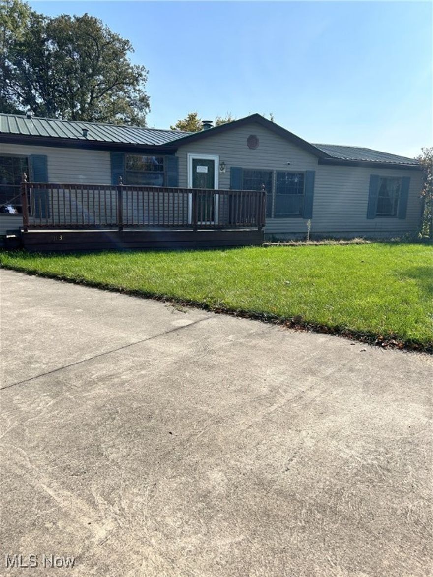 This one story home sits on 1 acre of land with 4 car detached garage located on a cul-de-sac. Home has newer Metal roof , updated kitchen, beautiful master bath, 3 beds , wood burning stove and large sunroom with Hot Tub. Seller is leaving all appliances including washer and dryer. Pack your bags and move in :)