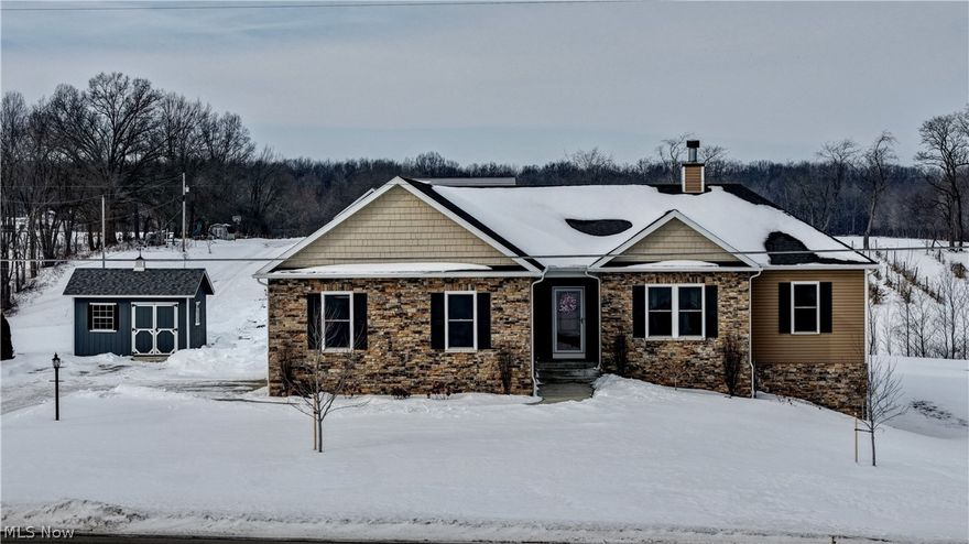 This gorgeous four-bedroom ranch sits on over 1.5 acres in a tranquil rural setting, with easy access to Route 30 and breathtaking views of horses, farmland, a stream, and a pond. Located in the Dalton school district, this home combines privacy with exceptional everyday livability. Inside, you’ll find a thoughtfully designed split-bedroom plan that maximizes comfort and privacy. The kitchen shines with granite countertops and solid wood doors throughout. The great room features cathedral ceilings and a cozy wood-burning fireplace, while nine-foot ceilings flow throughout, including the finished walk-out basement. The expansive, partially finished basement adds over 1,200 square feet of flexible living space, plus another full bath—ideal for a recreation room, home theater, or guest suite. Outside, enjoy ample room for outdoor activities, gardening, or simply sitting on the back deck under your pergula enjoying the scenic surroundings. Property also includes a 10x14 storage barn and the home is wired for a generator. Schedule your private showing today.