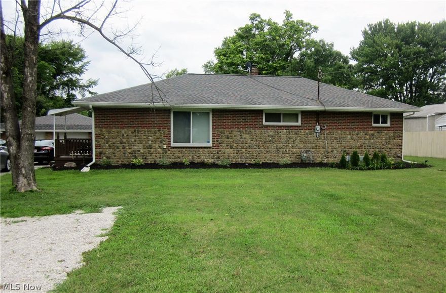Welcome home to this maintenance-free Ranch! Brand new in 2014: Cortec Luxury Vinyl Plank flooring, roof on home & garage w/tear-off, seamless gutters & vinyl sofits, carpeting, light fixtures, electric, & door hardware! A walk out the back door leads to an 18x16 concrete patio poured in 2015! Newer windows, hot water tank, & an updated kitchen w/stainless appliances! Extra large bedrms w/space for a king-size bed in the master! Full bath features a walk-in double shower! Slag driveway w/turn-around leads to an oversized garage! Non-buildable wooded lot next door & the fenced yard offers much privacy! All this on a 1/2 acre lot all ready for your personal touches! And, no city income taxes! Just the perfect home for singles, first-time home buyers, or retirees! Only 10 minutes away from all the shopping & eateries on 303 or South park in Strongsville! Interstate 71 & the Ohio Turnpike are within easy reach! What the heck are you waiting for?
