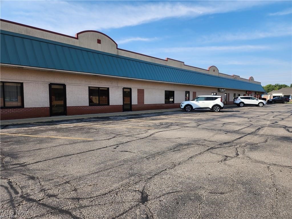 This commercial rental located in Elyria is in a high traffic area on North Abbe Rd. near State Route 57/113 and LCCC College . This unit has an entryway, reception area, two restrooms, large kitchen, beverage center, two extra large rooms/offices with sinks, three regular sized rooms/offices, one regular sized room/office with sink, storage closets , approximately 1900 square feet. Convenient off street parking in front of the unit, to the side and in back. Owner looking for long term lease. Tenant pays electric and gas. Owner pays for water/sewer depending on the business. Owner will make renovations depending on lease terms and business. Lots of different opportunities for a local retail/business such as a Doctor's Office, General Office space. Tenants do your due diligence on checking with the city. Easy to show. Bring a flashlight, electric not on.