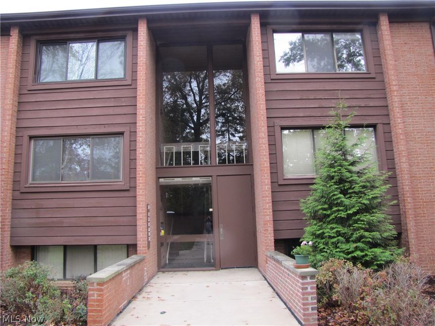 Updated kitchen and bathrooms.  Freshly painted, open floor plan.  Closest building to indoor parking garage & parking lot.  Updated kitchen shines with stainless appliances, new cabinets, Corian countertops with undermount Corian large sink, waterproof luxury plank flooring, and subway tile backsplash.  Updated Bathrooms have waterproof luxury flooring, new vanities, fixtures and beautiful tilework.  Spacious 3rd floor condo offers outdoor entertainment on covered balcony that spans length of dining and living room with windows and sliders overlooking trees and green space.  Storage space available off balcony, above the unit, and in the garage.  In-unit laundry space with washer and dryer.  Locked garage with inside car wash station.  Enjoy Greenwood Village clubhouse with outdoor pool, indoor pool, fitness center, tennis courts, hiking trails and lake.  Greenwood Village located next to Cuyahoga Valley National Park and MetroPark trails.