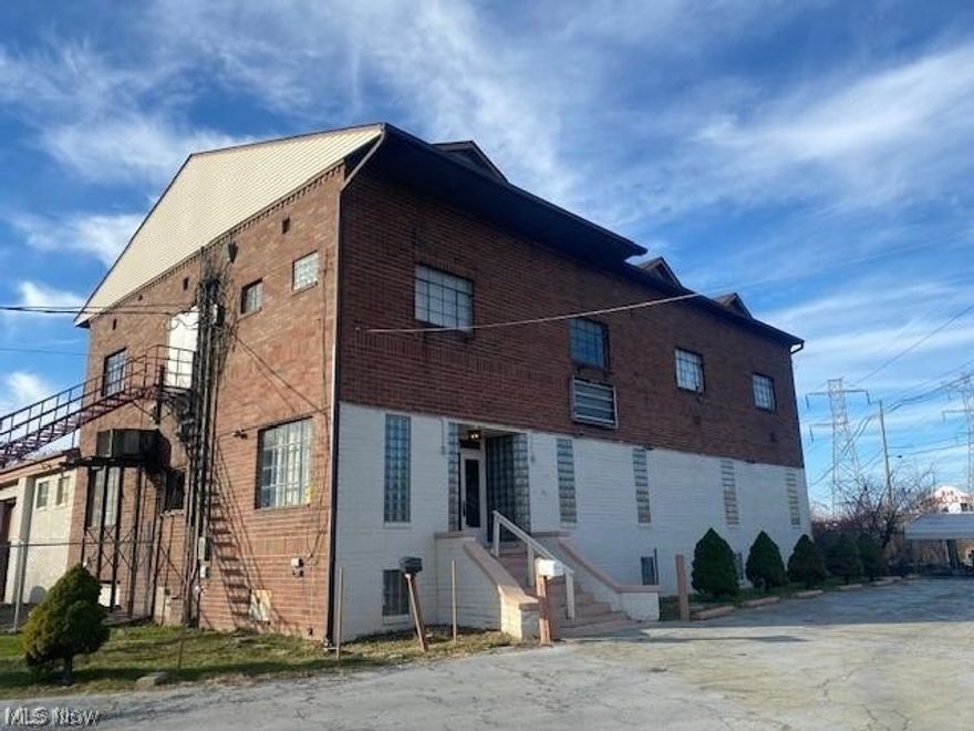 15,000 Sq Ft of commercial/industrial space in Austintown! Situated on over 4 acres.  This might be the best buy on the market.  Unlimited uses and the current tenants more than pay for your investment.  Newer roof and many upgrades.  Call today to take a look!