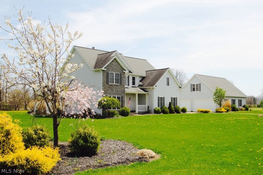 Charming 4 Bedroom Colonial in Valley City located in Medina County. As you walk through the front door you are warmly greeted by a two story (17 ft high) Foyer and Living Room that has a gorgeous fireplace as its centerpiece. The Eat-in Kitchen is an open concept to the living room as well and is accented by Stainless Steel appliances and walks out onto a huge concrete patio. The first floor also has a bedroom with a full bath and a formal Dining room. On the second floor you will find a huge master bedroom with a cove ceiling. Master bath has large Garden tub, stand up shower and dual sinks and has a 11x9 walk in closet! Second floor also has two very large bedrooms with a full bath between. Second floor has a laundry room! NO lugging laundry up and down the stairs!
In the basement there is a pool table room with a bar area. There is also a 27x13 Family room in the basement with a propane fireplace. Brand new sump pump with battery back up.
If that wasn't enough.... There is a 2 ca