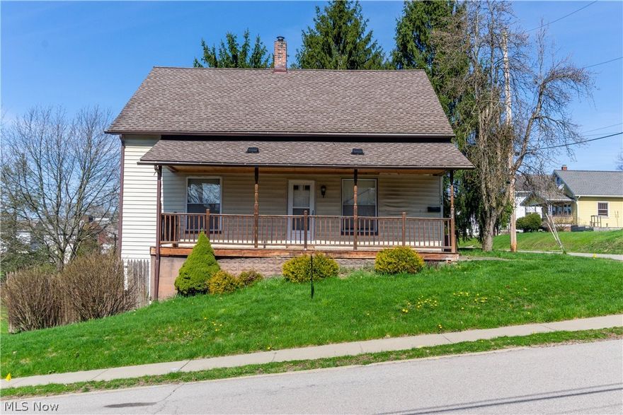 Handyman/Investors Wanted!! This home may need some final touches but with a little elbow grease it could be an attractive rental or primary residence.  Home already has some updates completed.  Most of the windows have been replaced, roof is approx. 8 years old, newer kitchen cabinets with laminate flooring in Kitchen and dining room.  Home has 4 large bedroom, 2 beds on main floor and 2 on the second floor.  Home features an oversized lot with a large yard.  Has the potential to be turned into a duplex or add an in-law apartment with walk out basement.  Home being sold "As-Is".  Bring al offers!