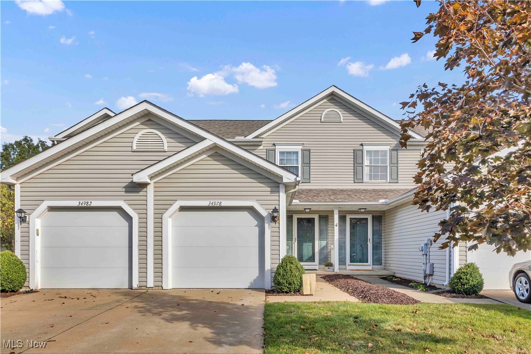 Lots of modern updates in this charming 2 bedroom, 1.5 bath townhome featuring an open floor plan, full unfinished basement, and attached garage in a desirable location close to highways, shopping, and dining! The welcoming entry leads to a convenient half bath and into the recently updated kitchen with granite countertops (2022), new sink (2022), white cabinetry, upgraded stainless appliances (2020), and stylish new flooring (2023). The kitchen opens to a spacious living room with access to a private deck for outdoor relaxation. LVP flooring runs throughout the first floor, offering durability and easy maintenance, perfect for pets! Upstairs offers two generously sized bedrooms including a primary suite with two closets, and a full bath beautifully updated with a large vanity and waterproof flooring. Both bathrooms feature modern finishes, the roof was replaced in 2023, and this move-in ready home offers low maintenance fees and quick occupancy, an outstanding and affordable opportunity!
