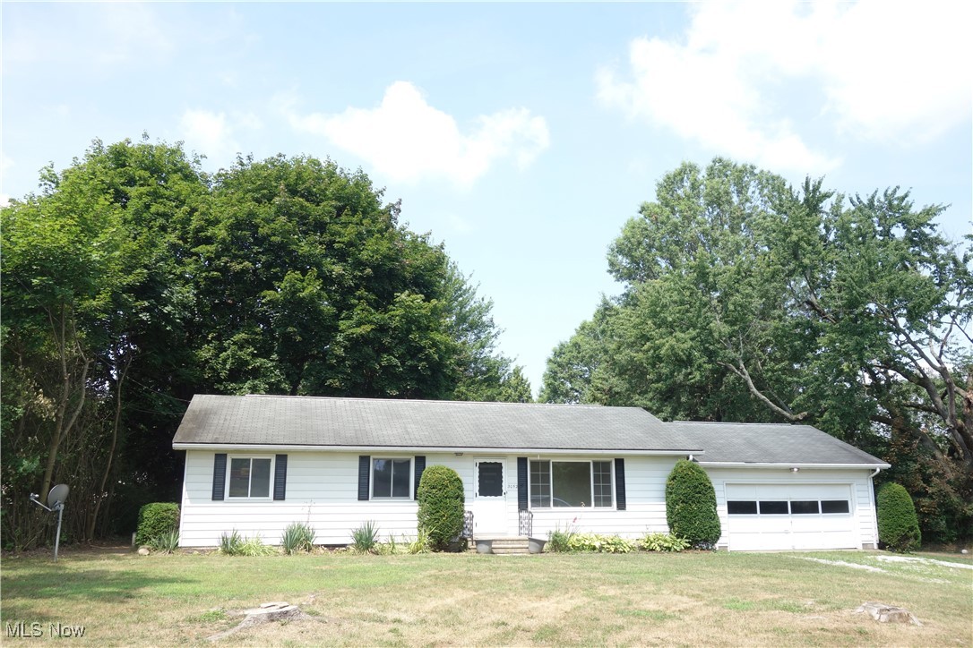 *Roomy Ranch in the Portage Lakes Area* Super clean home w/a Full basement and an Attached 2 Car Garage, all nestled on a Private almost 1/2 Acre Lot! Enjoy An Inviting, large Living Room w/"Real Hardwood Flooring that shines" + A Delightful Kitchen w/a Breakfast Bar and a large Dining area w/ room for your table & chairs + Sliders to a patio & Great Big, Wonderful Back Yard! Two of the Bedrooms have Brand New Carpet w/ hardwood floors underneath + a 3rd Bedroom w/ gleaming Hardwood flooring. A Full Bathroom w/ shower/tub combo on the 1st Floor + a conveniently located 1/2 Bathroom. A large, Unfinished Basement awaits your ideas, A Gas Furnace & Central A/C approx. 10 years Old. An Attached 2+ Car garage w/ Room to maybe Park an RV and/or Boat, All Beautifully Located on a dead-end Street w/a Country-Private feeling* BONUS: *Minutes to Public Boat Launches at the Portage Lakes State Park* Close to Dining, Shopping, Entertainment + very accessible to all destinations w/ easy X-way access. *See Broker Remarks