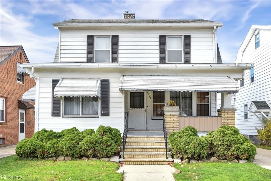 Prepare to be Moved! Welcome to 4916 East 111th St - a charming Colonial home with plenty of updates & character. Step into the spacious living room & admire the crown molding, hardwood floors, & a brick fireplace w/ built-in cabinets. The sunroom off the living room is a perfect space to relax w/ lots of natural light & could make a great office space. The formal dining room has corner leaded glass cabinets for displaying your favorite pieces. The kitchen offers plenty of cabinet & counter space, updated flooring & a tile backsplash, plus a mudroom off the kitchen w/ back door access. The 2nd floor has 3 bedrooms w/ hardwood floors under the carpet & a full bath. The primary bedroom has a balcony overlooking the backyard. The basement is spacious & unfinished w/ plenty of potential. There is another full bath & laundry room, as well as a convenient utility tub. Outside, you will find a detached 2-car garage & a covered front porch. The backyard is perfect for entertaining. This well-maintained home is in a desirable Garfield Heights neighborhood, just down the road from the Garfield Park Reservation. Shopping, healthcare, & I-480 are in close proximity. Recent updates include additional insulation added between siding, water line replaced, several windows replaced, gas pipes & electrical updated, fresh paint throughout, & more. Take a tour of 4916 East 111th St & envision yourself living in this beautiful home!