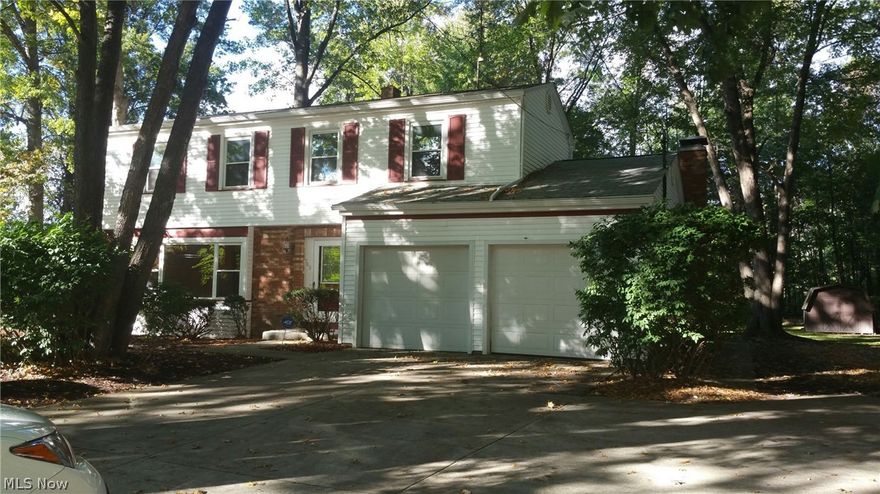 Freshly painted 2 story in great Howland neighborhood location. Kitchen w/appliances & eating area adjacent to family room w/fireplace & doors leading to patio & wooded lot. Dining room w/wainscoating. Hardwood floors throughout. Finished basement w/rec room. Located on great cul-de-sac.