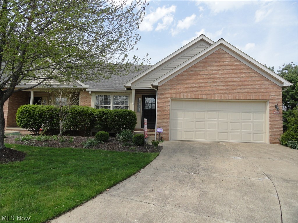 Nice ranch condo situated on a cul de sac lot with semi private backyard. The foyer entry steps into the eat-in kitchen with beautiful hardwood floors , wood cabinets and a pass through to the dining room. The living room is open to the dining room and includes a vaulted ceiling, skylight and gas fireplace. Cozy den/sun room has a cathedral ceiling and sliders to the deck porch overlooking a grassy area. First floor master suite with sliders to the deck porch, a glamour bath with jetted garden tub and separate shower. All new carpet on the first floor. The second floor has a guest bedroom, full bath and a loft with a skylight overlooking the living area below! First floor laundry plus a full basement with plenty of storage potential or room to finish. Newer furnace and AC too! The two car garage has a handicap lift which seller can remove if requested.This is a lovely home in a desirable neighborhood just waiting for you