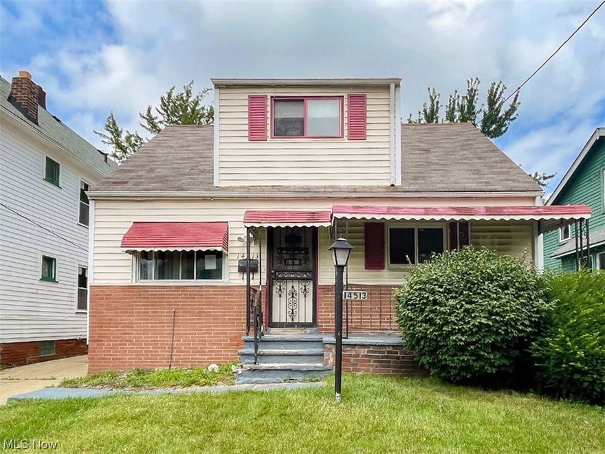 Don't miss the opportunity to own this 4 bedroom, 1.5 bath Cape Cod with approximately 1,159 square feet of living space as well as a partially finished basement! Features include an enclosed porch to sit on for tons of fresh air and sunlight, huge windows letting natural light and the sun in, a living room, a kitchen with built-in cabinets, a dining area, and a backdoor that leads to your screened porch to sit and relax on! The 2-car garage has more than enough space for storage! Conveniently located near schools, shopping, & everything Cleveland has to offer! TONS of Potential!! Being sold AS IS, WHERE IS, Buyer is responsible for all required inspections & certifications. All info & property details set forth in this listing, including all utilities & all room dimensions which are approximate, are deemed reliable but not guaranteed & should be independently verified if any person intends to engage in a transaction based upon it. Seller/current owner does not represent and/or guarantee that all property info & details have been provided in this MLS listing.