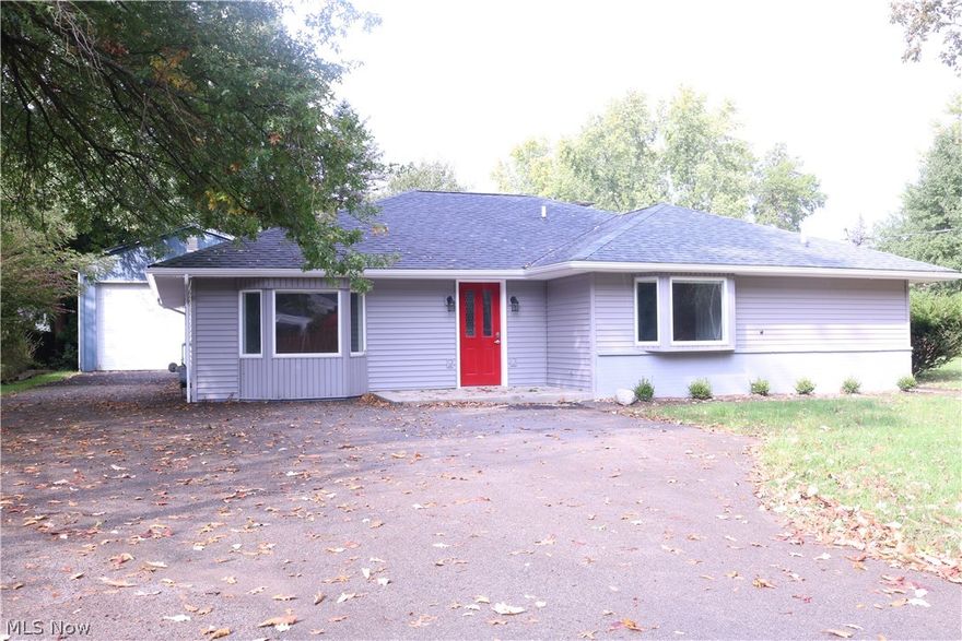 Simply stunning whole house remodel! Nothing has been left undone, in this 3 bedroom, 2 1/2 bath ranch home. Spectacularly large formal entry with "wood" laminate flooring that extends into the large formal living room. Huge kitchen, with brand new, modern white cabinetry, neutral countertop, and gorgeous, hardy 2 x 1 ft porcelain tile that extends into laundry, half bath, and an enormous formal dining room with sitting area! All bathrooms like a shiny new penny, with a high end look.  Both full baths have ceramic surround to bathing/shower areas, porcelain tile flooring, commode, and new white vanity. Half bath has porcelain tile flooring, pedestal sink, & commode.  Spacious master bedroom has 2 walk-in closets and new frieze carpeting, which can also be found in the remaining 2 bedrooms.  Siding & windows (except for 2 bay windows) 2018. Roof approx 6 yrs old. Hot water tank 2015. Sewer to street replaced approx 4 years ago. High efficiency furnace. Central Air. The gi-nourmously ove