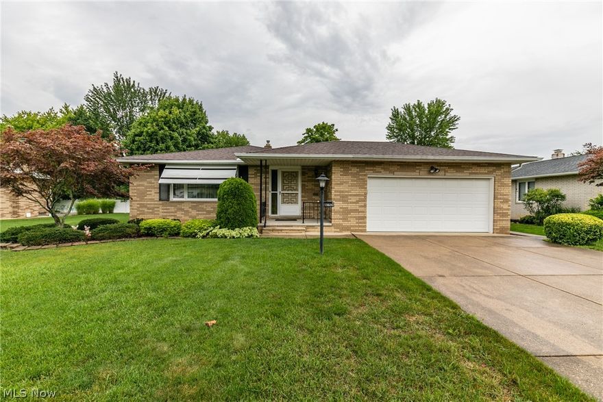 Lovely 3 bedroom, 2 full bath full brick Ranch situated on a quiet street street in Middleburg Hts Indian Creek Estates development; conveniently located close to shopping, dining, quick interstate access, library & recreation center. Beautifully maintained exterior with lush landscaping, newer roof(2015) & charming covered porch entry. Inside you will appreciate the neutral pallet for easy personalization and pristine hardwood flooring underneath carpet areas. Great open layout starting with the large & bright living room, conjoined to the formal dining room, perfect for gatherings. The eat-in kitchen provides plenty of cabinetry & prep space, included appliances & dining area. 3 comfortable bedrooms including an owner's suite w/ & en-suite bath! Another full bathroom completes the main level. More living space is found in the expansive finished basement complete w/ a sprawling recreation room, loads of storage space, laundry area & shower. Great patio to host a BBQ. 1 year home warra